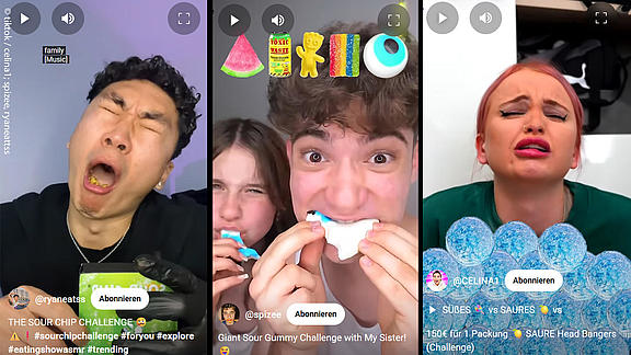 Drei TikTok-Videos nebeneinander: Links ein junger Mann mit schmerzverzerrtem Gesicht bei der „Sour Chip Challenge“, in der Mitte zwei Jugendliche mit riesigen Gummisüßigkeiten, rechts eine Frau mit blauem Lippen-Make-up, die scheinbar auf sehr saure Bonbons reagiert. Emojis und Hashtags überlagern die Videos.