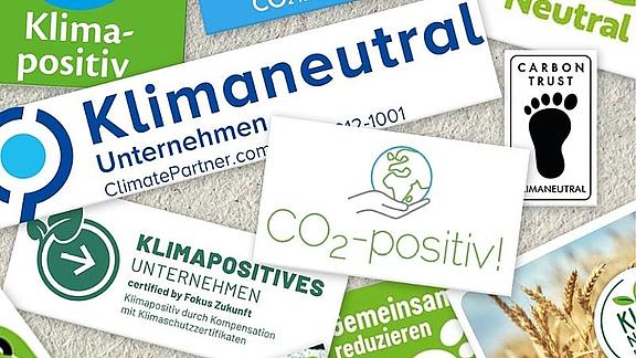Ausschnitte von klimaneutralen Labels