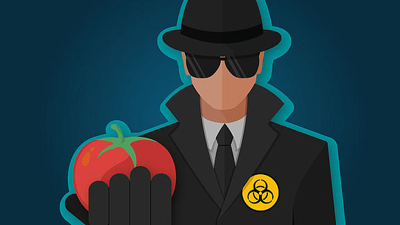 Geheimagent mit Tomate in der Hand